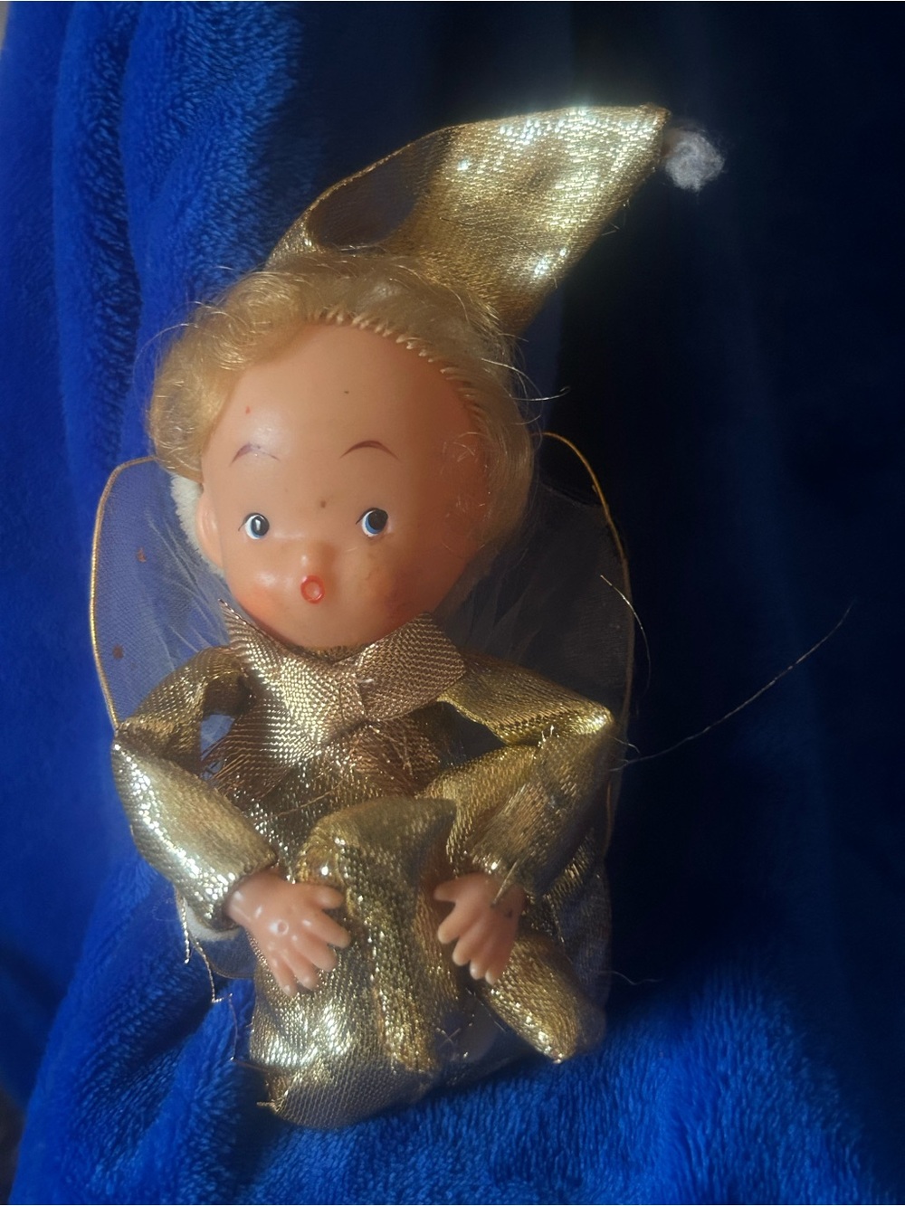 This is a vintage gold knee hugger angel pixie!